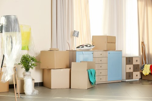 Office removals in Stockwell with packed boxes and moving team