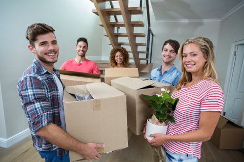 Professional movers handling furniture during a Stockwell house removal