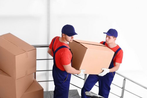 Professional movers handling furniture during a Stockwell house removal