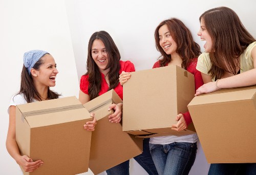 Removal team handling a home move in Stockwell with boxes and furniture
