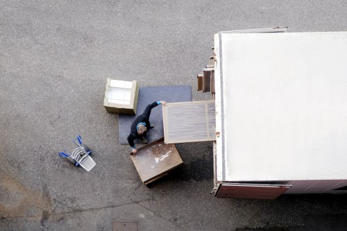 Packers preparing household items for a move in Stockwell