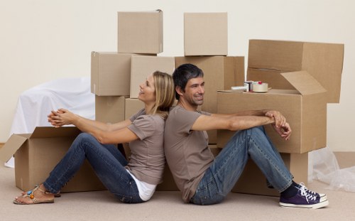Packed boxes and furniture prepared for a home move in Stockwell
