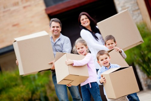 Packed moving boxes ready for a Stockwell man with a van service