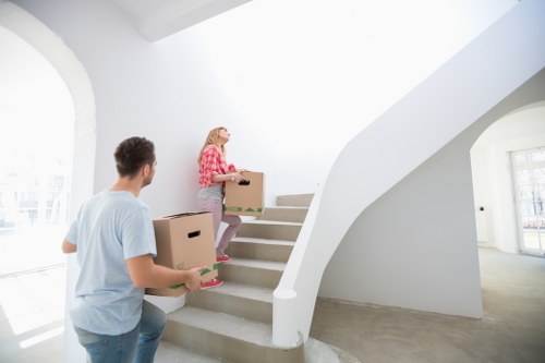 Professional moving van loading boxes in Stockwell